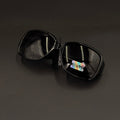Amara Black frame with blue smoky lenses and gold crystal temple