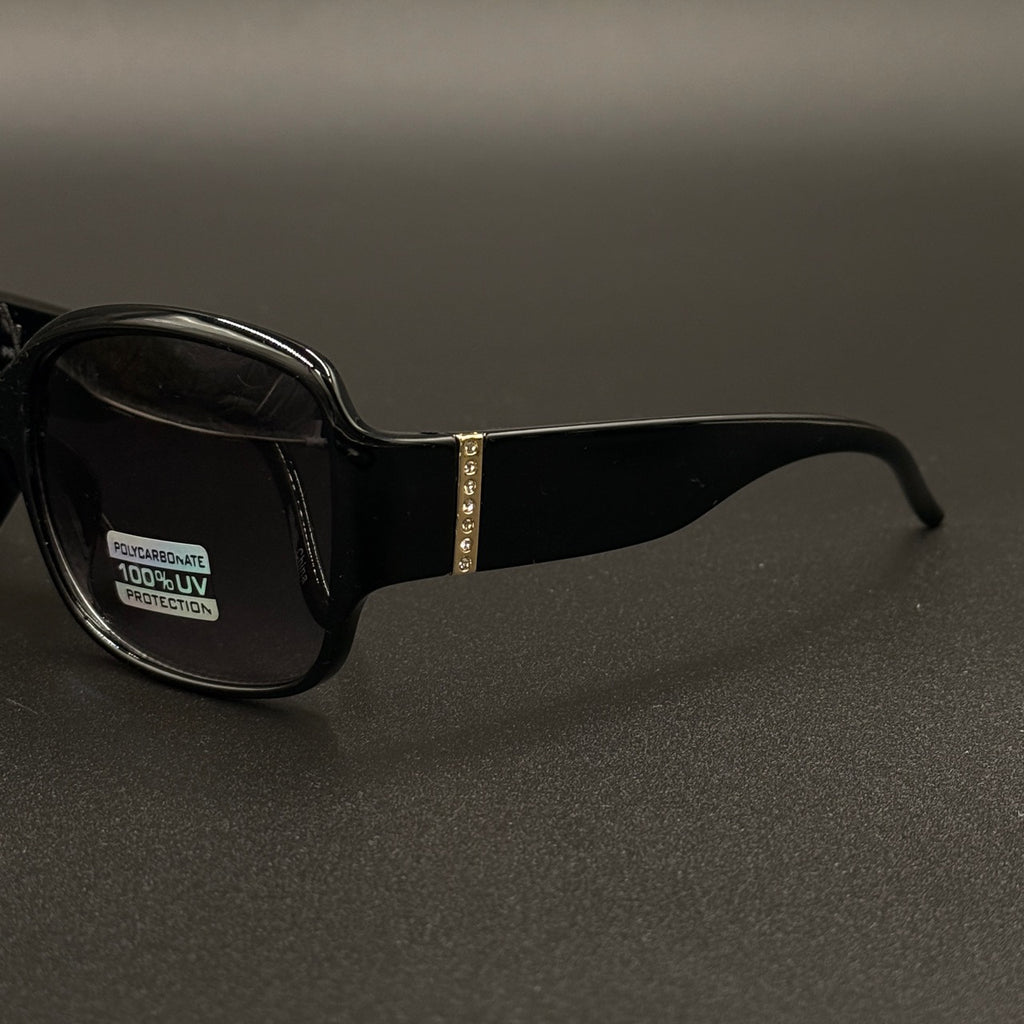 Amara Black frame with blue smoky lenses and gold crystal temple detail