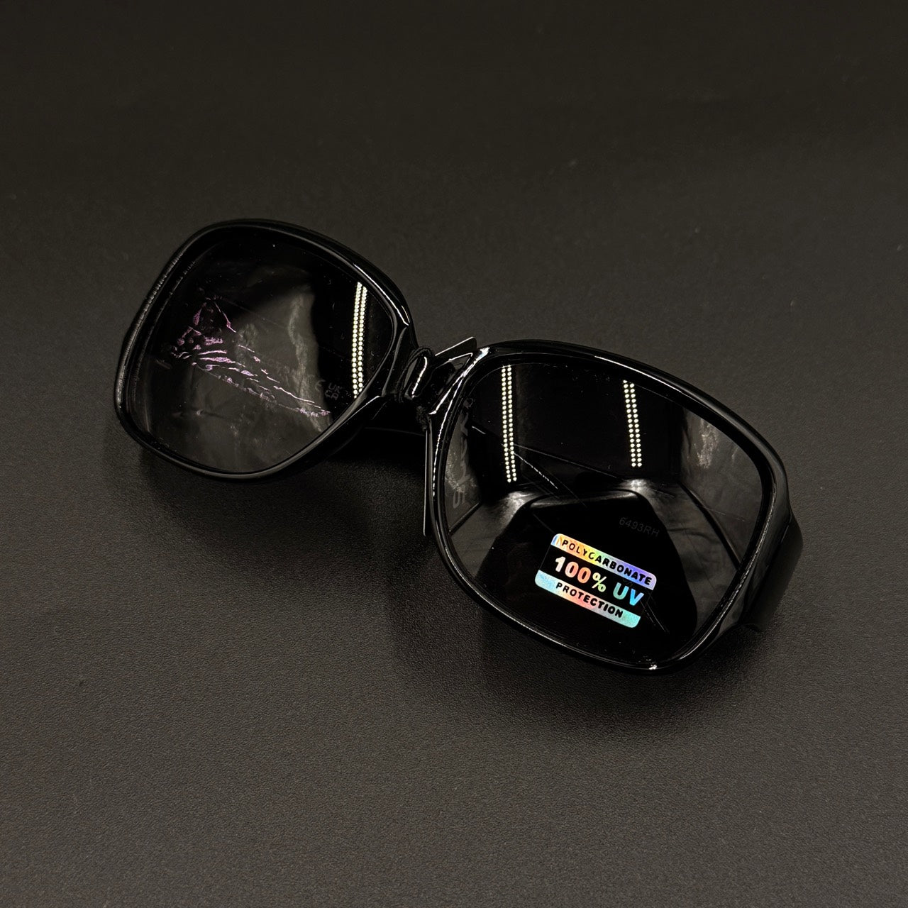Amara black frame with blue smoky lenses and silver crystal temple