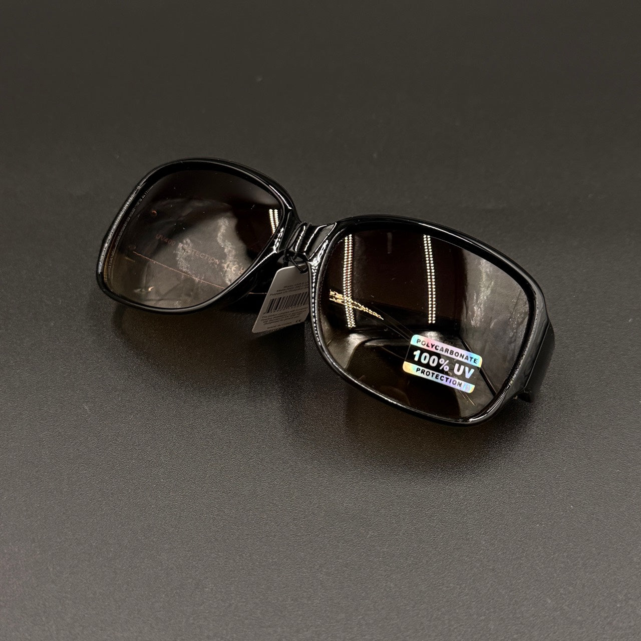 Amara tortoise frame with brown smoky lenses and gold crystal temple