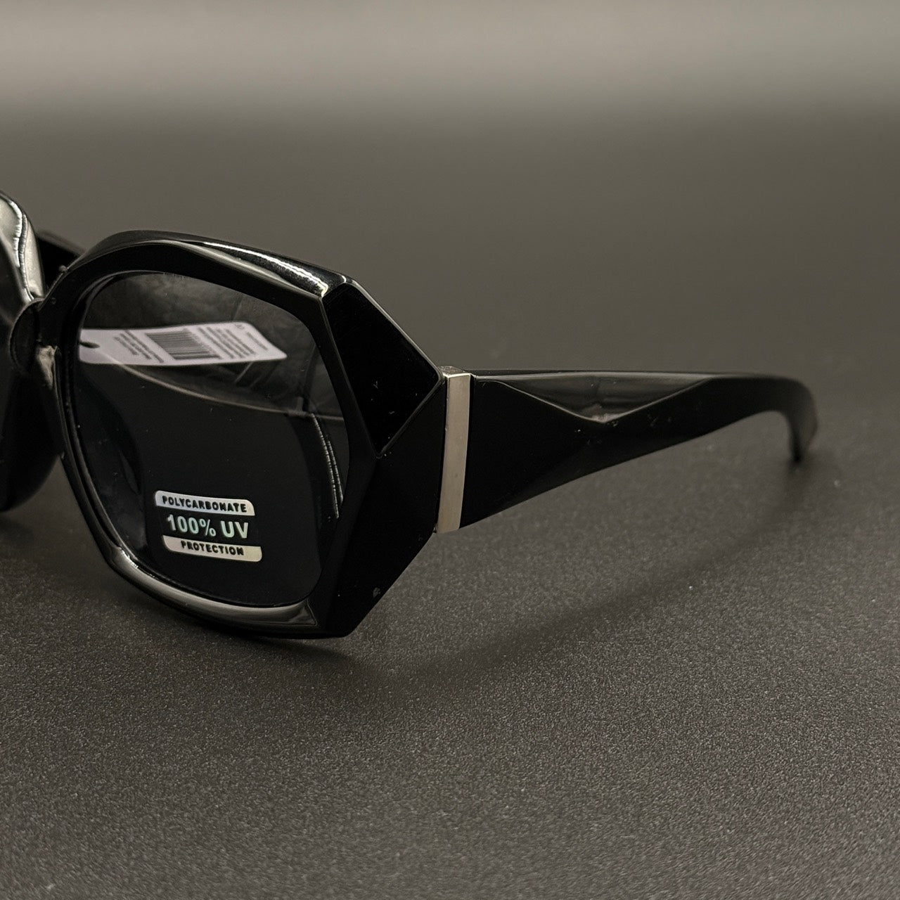 Sabrina black frame with smoky lenses and silver hinge detail