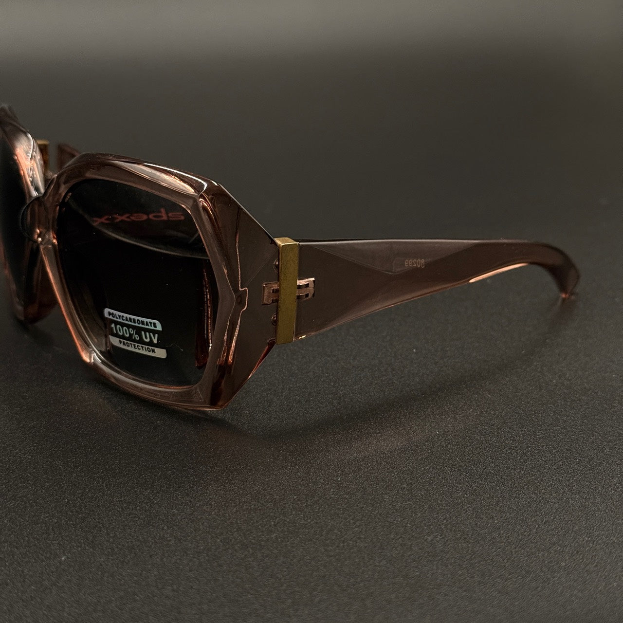 Sabrina pink frame with brown smoky lenses and gold hinge detail