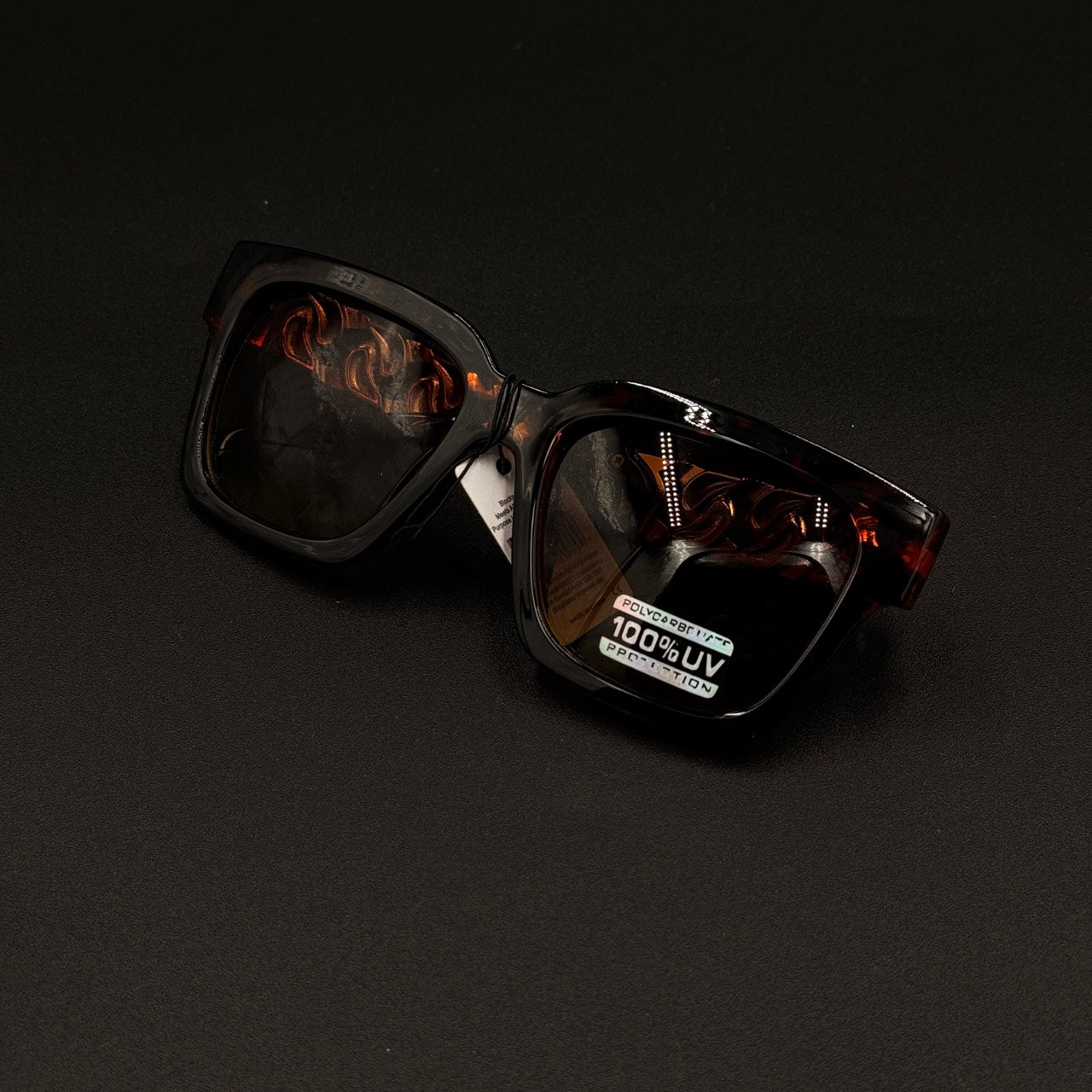Solenne tortoise gold main