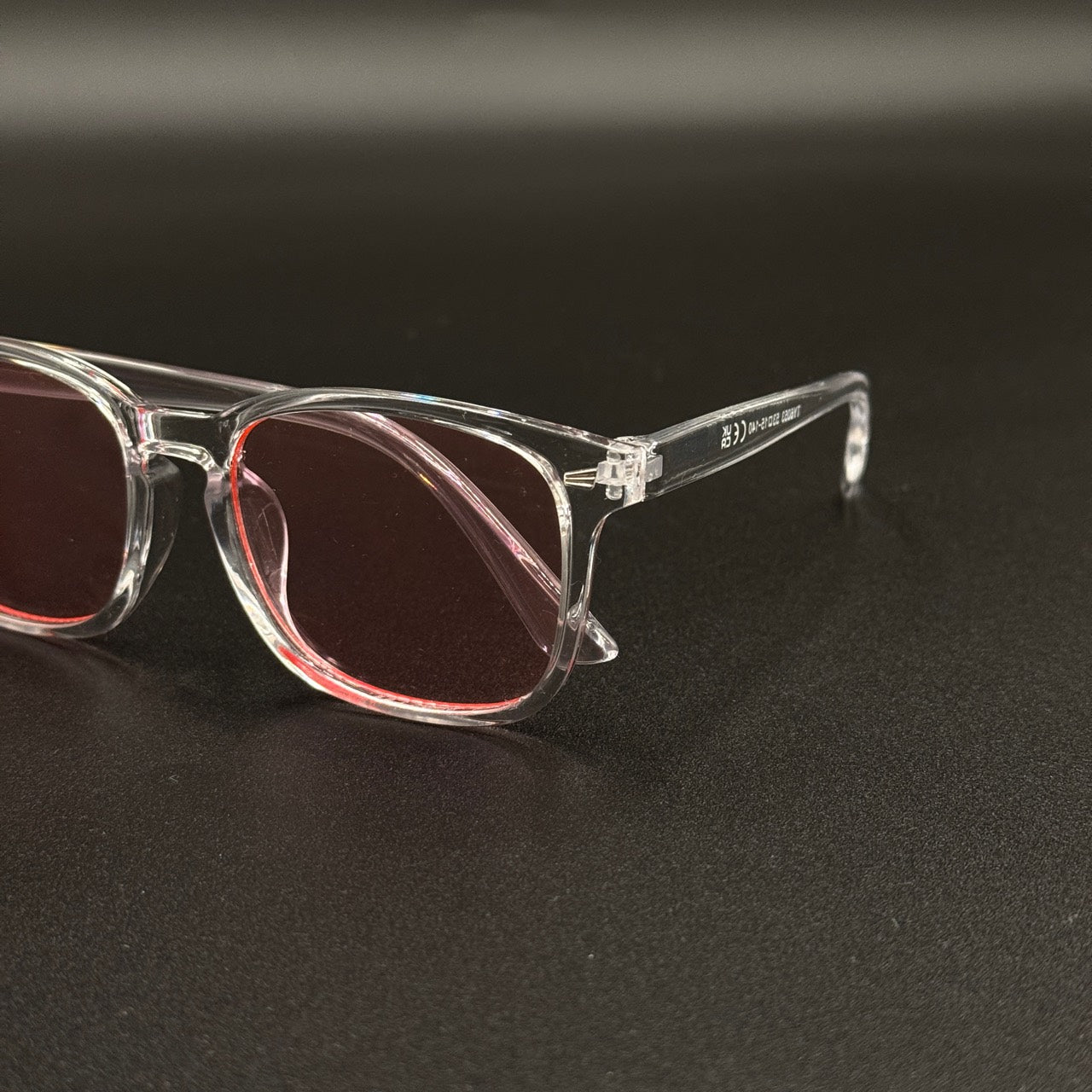 Mirelle clear frame pink lens temple detail